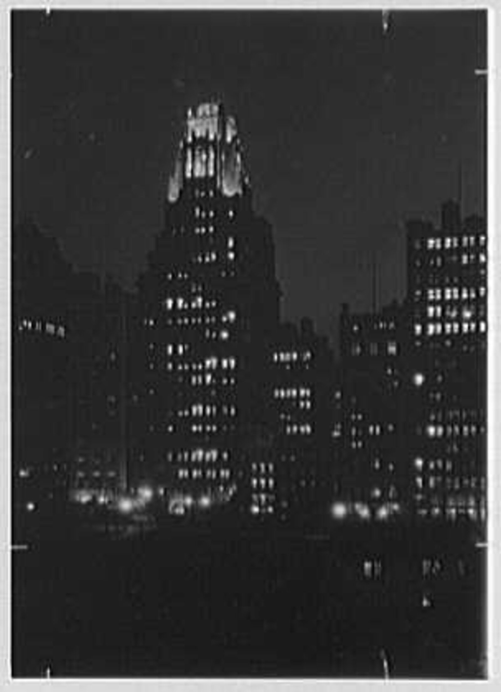 The American Radiator Building at night in New York City — the real building Georgia O'Keeffe painted