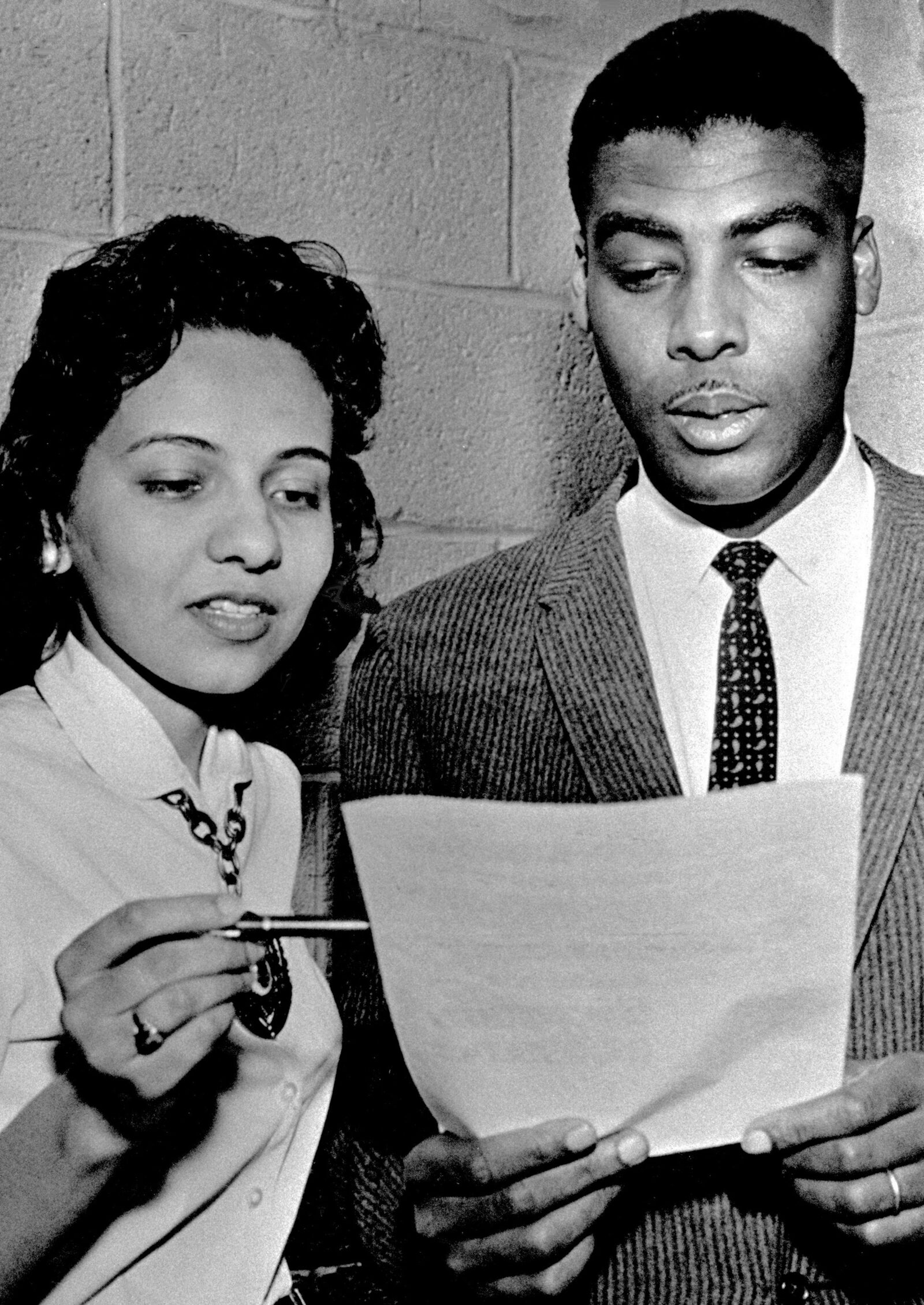 Diane Nash and Reverend Kelly Miller Smith review a prepared statement during the Nashville sit-in movement, 1960